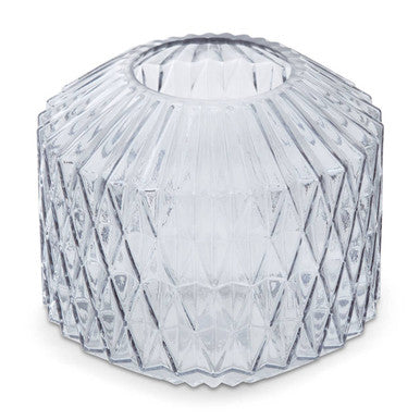 Clear glass geometric vase on a white background