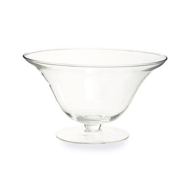 Clear glass martini glass on a white background