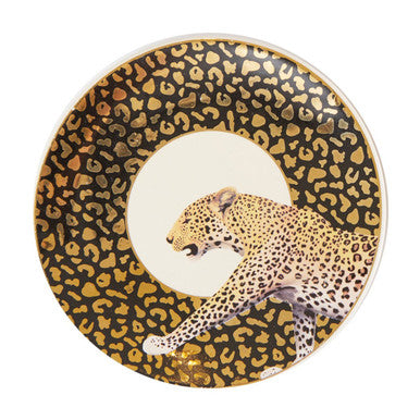 Decorative plate with a leopard design on a black background
