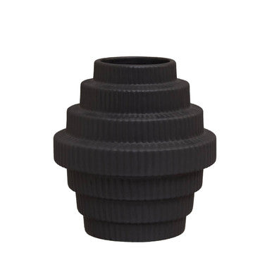 Black ribbed vase on a white background