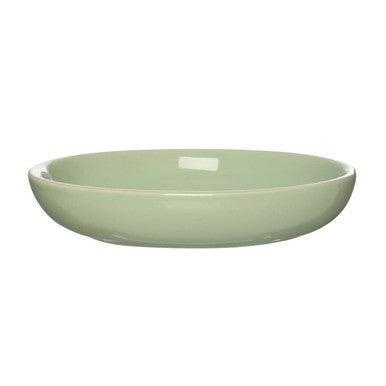 Green ceramic bowl on a white background