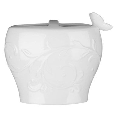 White ceramic whale-shaped planter on a white background