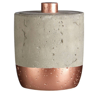 Concrete container with copper base and top on a white background