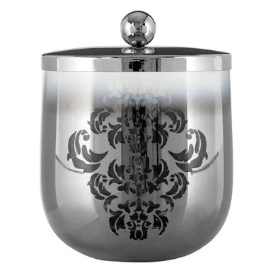Silver decorative jar with intricate black design on a white background