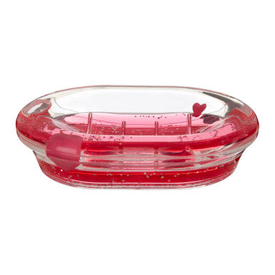 Red and clear soap dish with a heart design on a white background