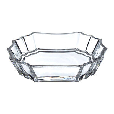 Clear glass bowl with faceted design on a white background