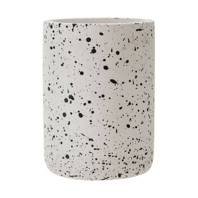 Speckled ceramic vase on a white background