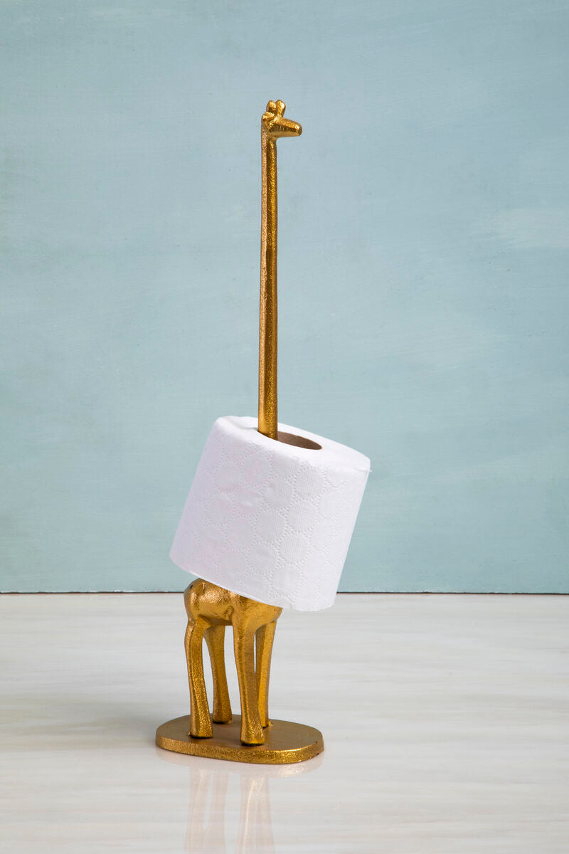 Gold giraffe-shaped paper towel holder with a roll of white paper towels on a light blue background.