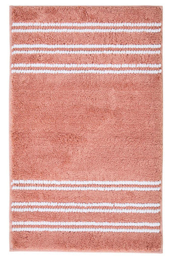 Pink bath mat with white stripes on a white background