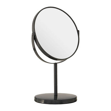 Black stand mirror on a white background