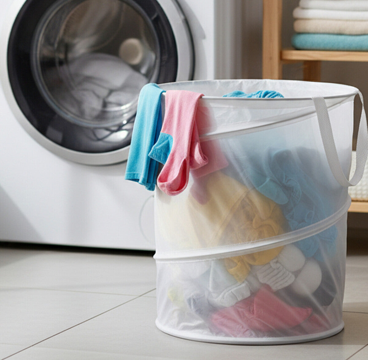 Laundry basket with clothes in front of a washing machine