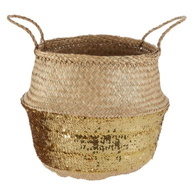 Woven seagrass basket with a textured surface on a white background