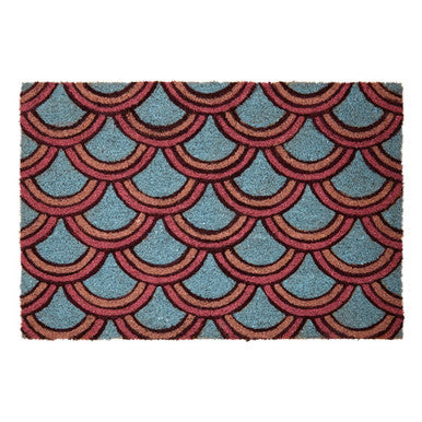 Doormat with red and blue geometric pattern on a white background