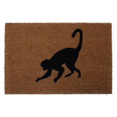Doormat with black monkey silhouette on a brown background