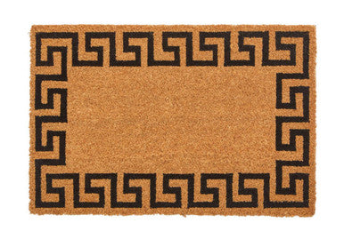 Doormat with black geometric border on a white background