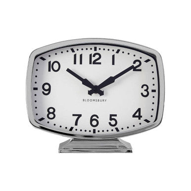 Rectangular clock with white face and black numbers on a white background