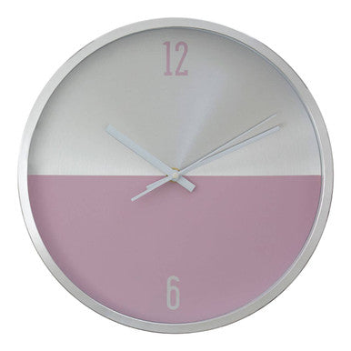 Wall clock with a white and pink design on a white background