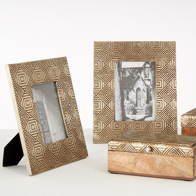 Set of decorative wooden photo frames and boxes with geometric patterns on a white background