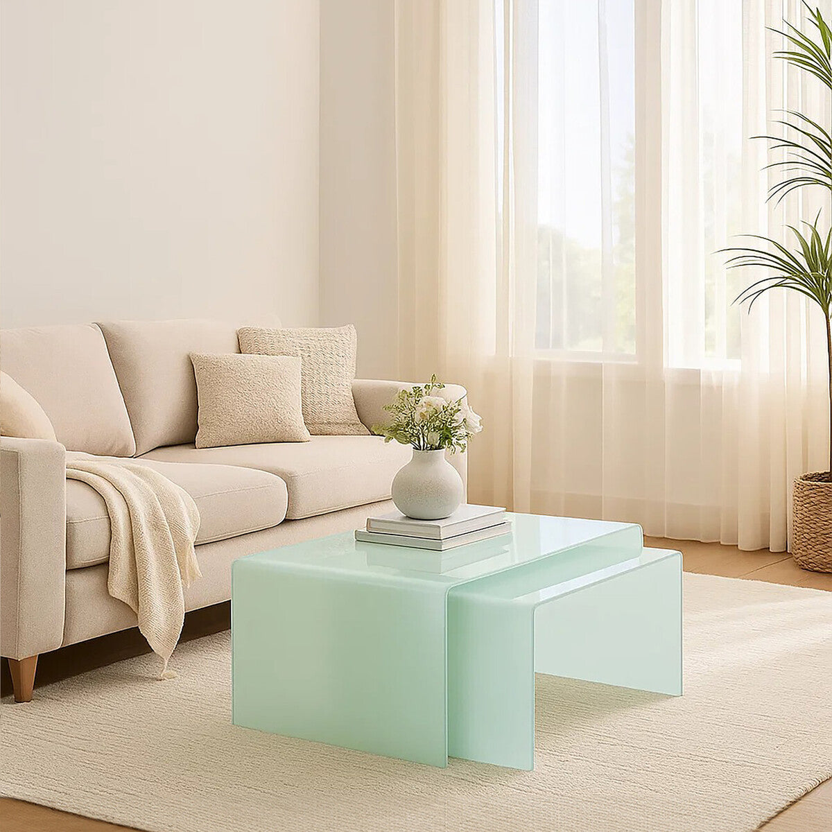 Light green coffee table in a living room with a beige sofa and decorative items.