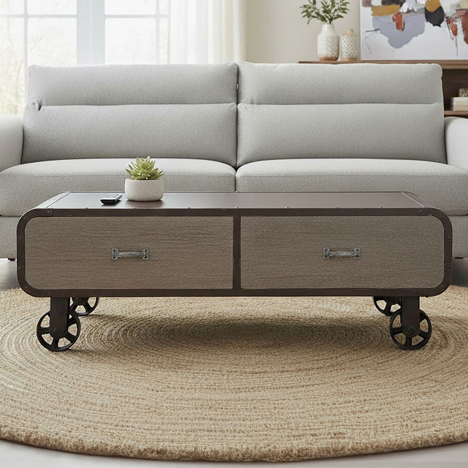 Gray sofa with a wooden coffee table in a living room setting.