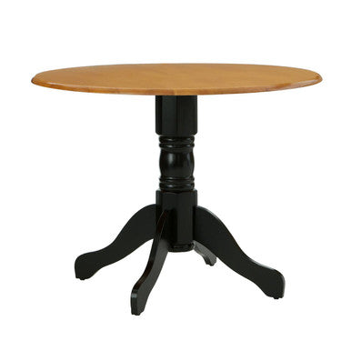 Round table with wooden top and black base on a white background