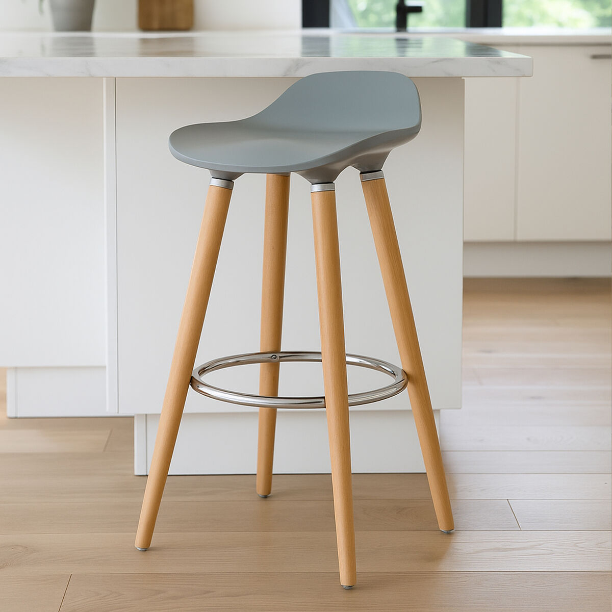 Bar stool with gray seat and wooden legs in a kitchen setting