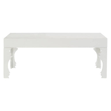 White bench with decorative legs on a white background