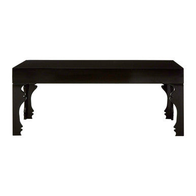 Black console table with decorative legs on a white background
