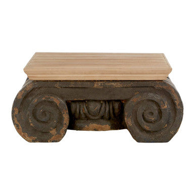 Decorative bench with wooden top and rustic metal base on a white background