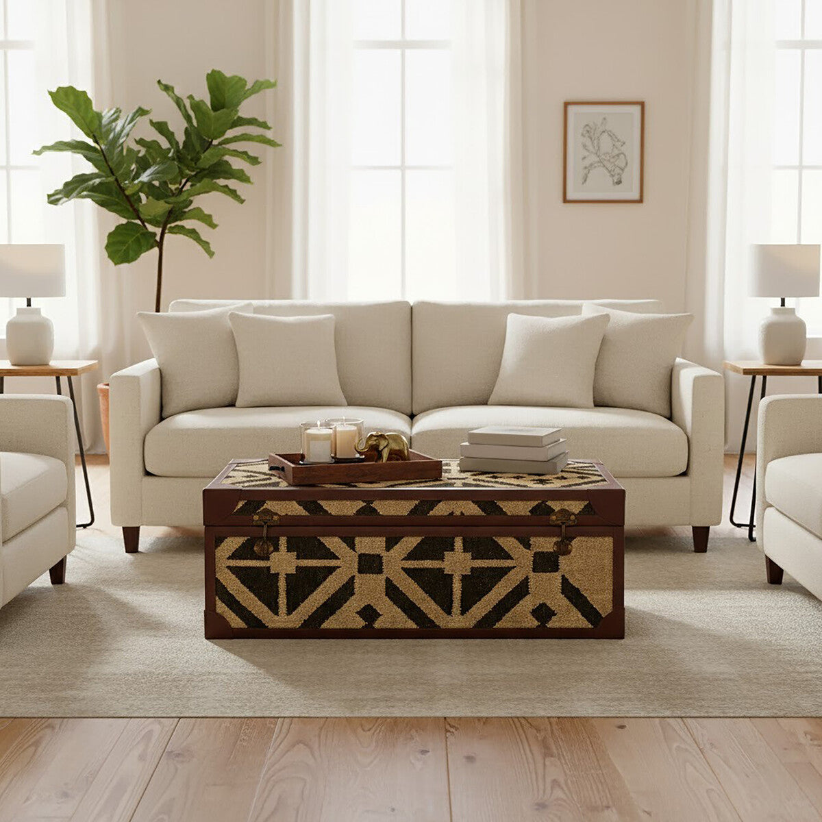 Living room with beige sectional sofa, patterned coffee table, and decorative elements.
