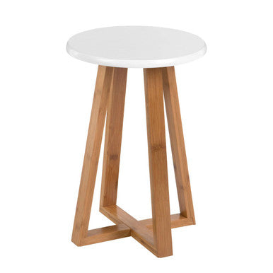 Small round table with a white top and wooden legs on a white background