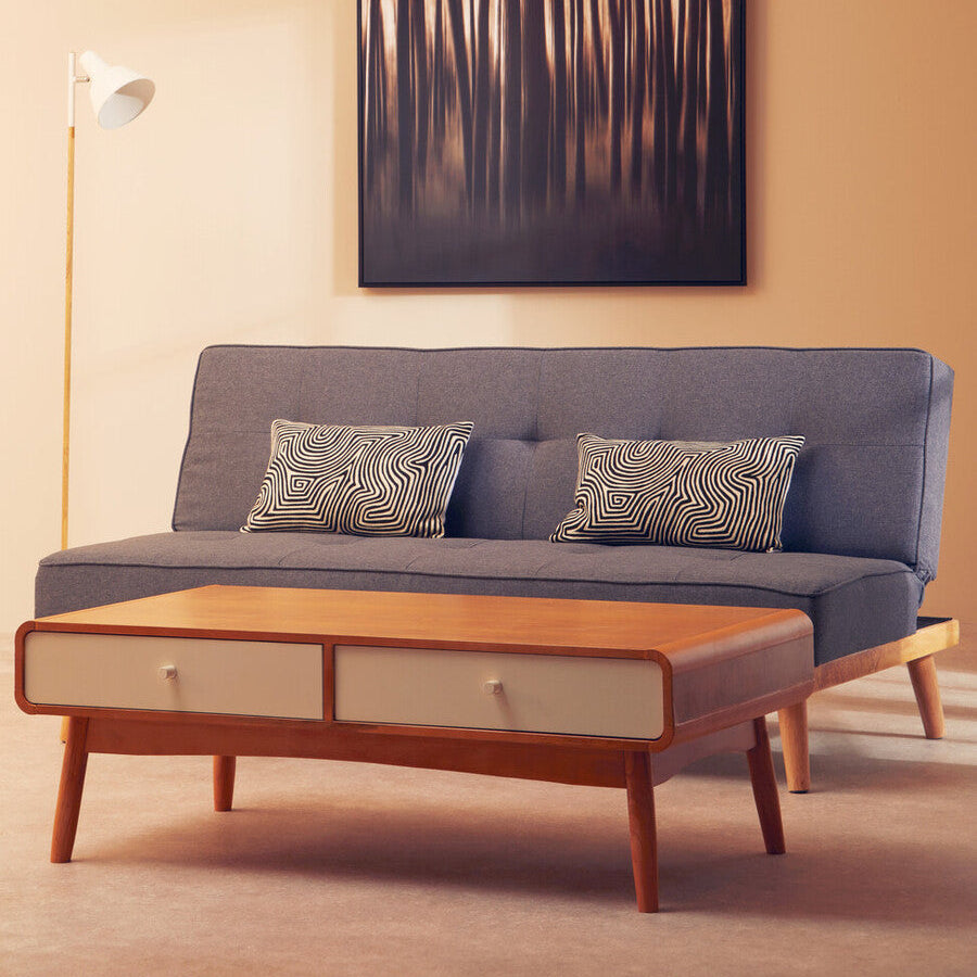 Modern living room with a gray sofa, wooden coffee table, and abstract art on the wall.