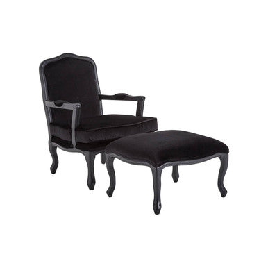 Black upholstered armchair with matching ottoman on a white background