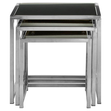 Set of three nesting tables with black glass tops and chrome frames on a white background