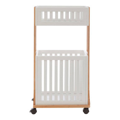 White crib with wooden frame on a white background