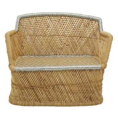 Woven chair with a diamond pattern on a white background