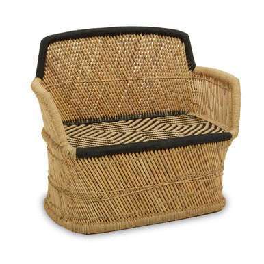 Woven chair with black accents on a white background