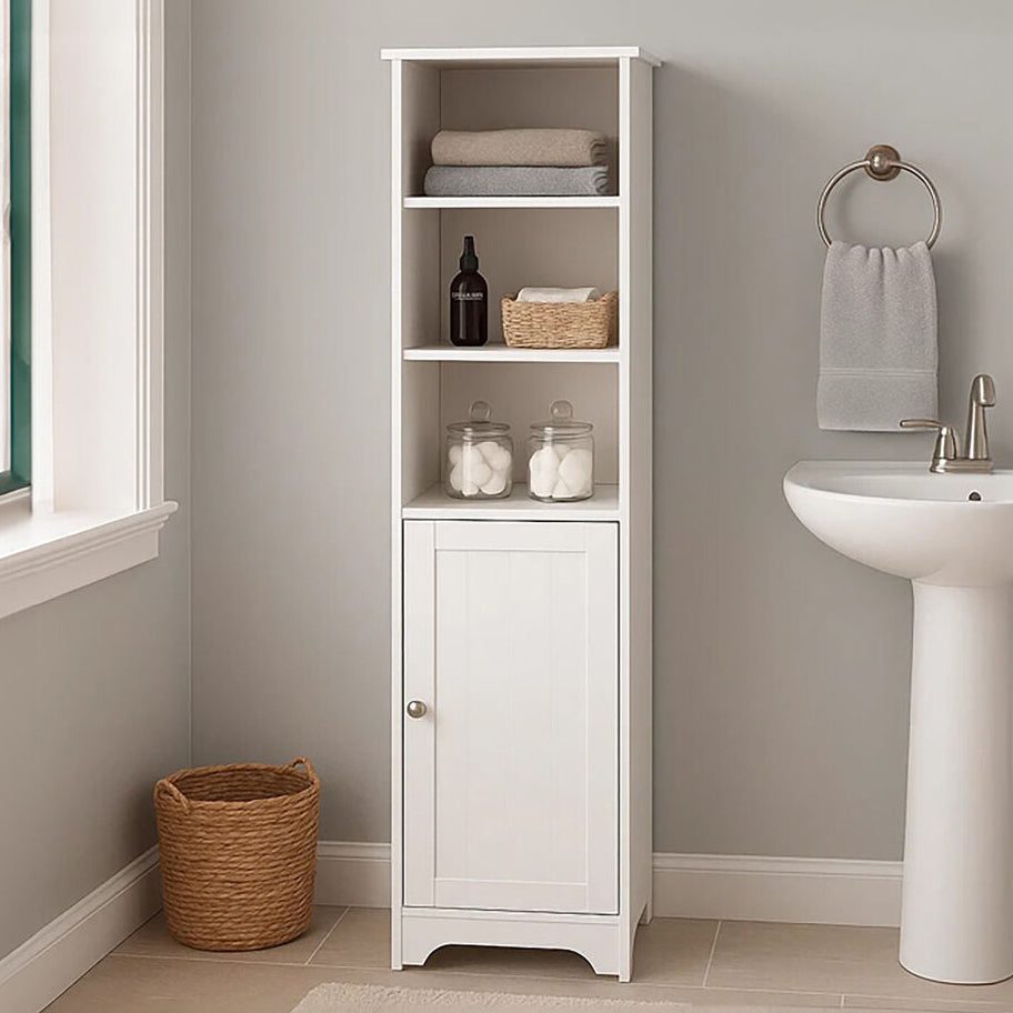 Bathroom with a white tall cabinet, sink, and towel.