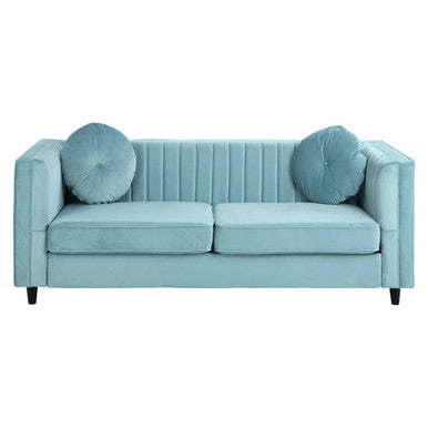 Light blue sofa with two round cushions on a white background