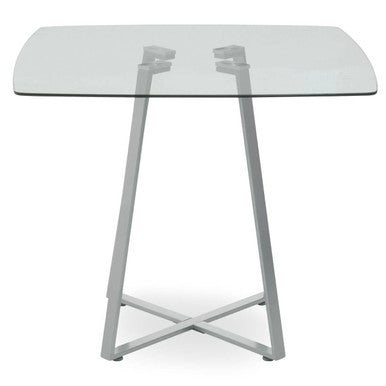 Glass table with metal legs on a white background