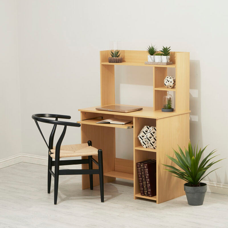 Wooden study desk with shelves and a chair in a room setting.