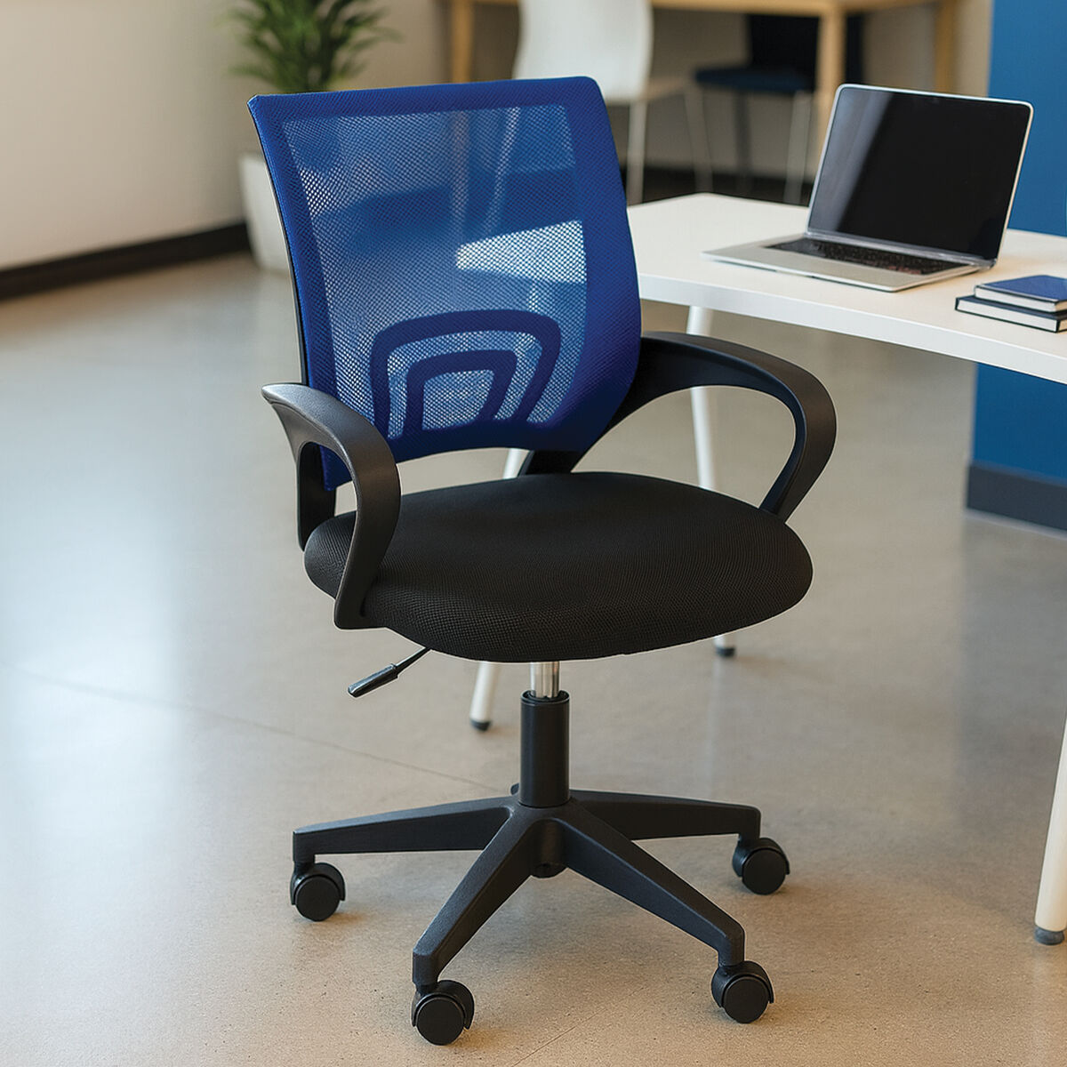 Blue office chair in an office setting with a desk and laptop.