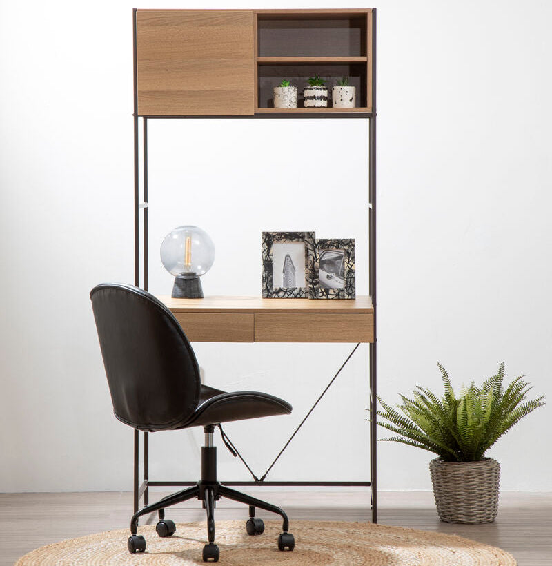 Modern office setup with a desk, chair, and decorative items against a white wall.