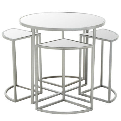 Set of three nesting tables with glass tops on a white background