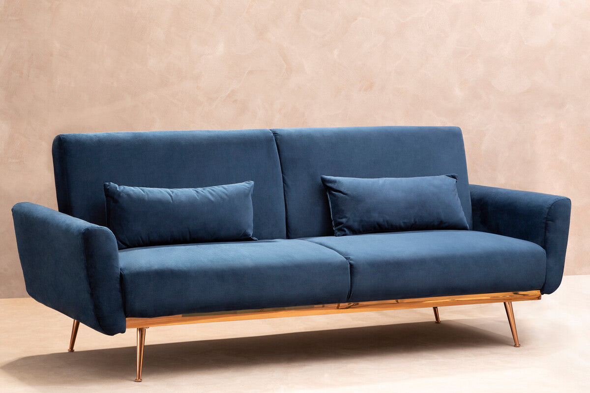 Blue sofa with wooden legs on a beige background