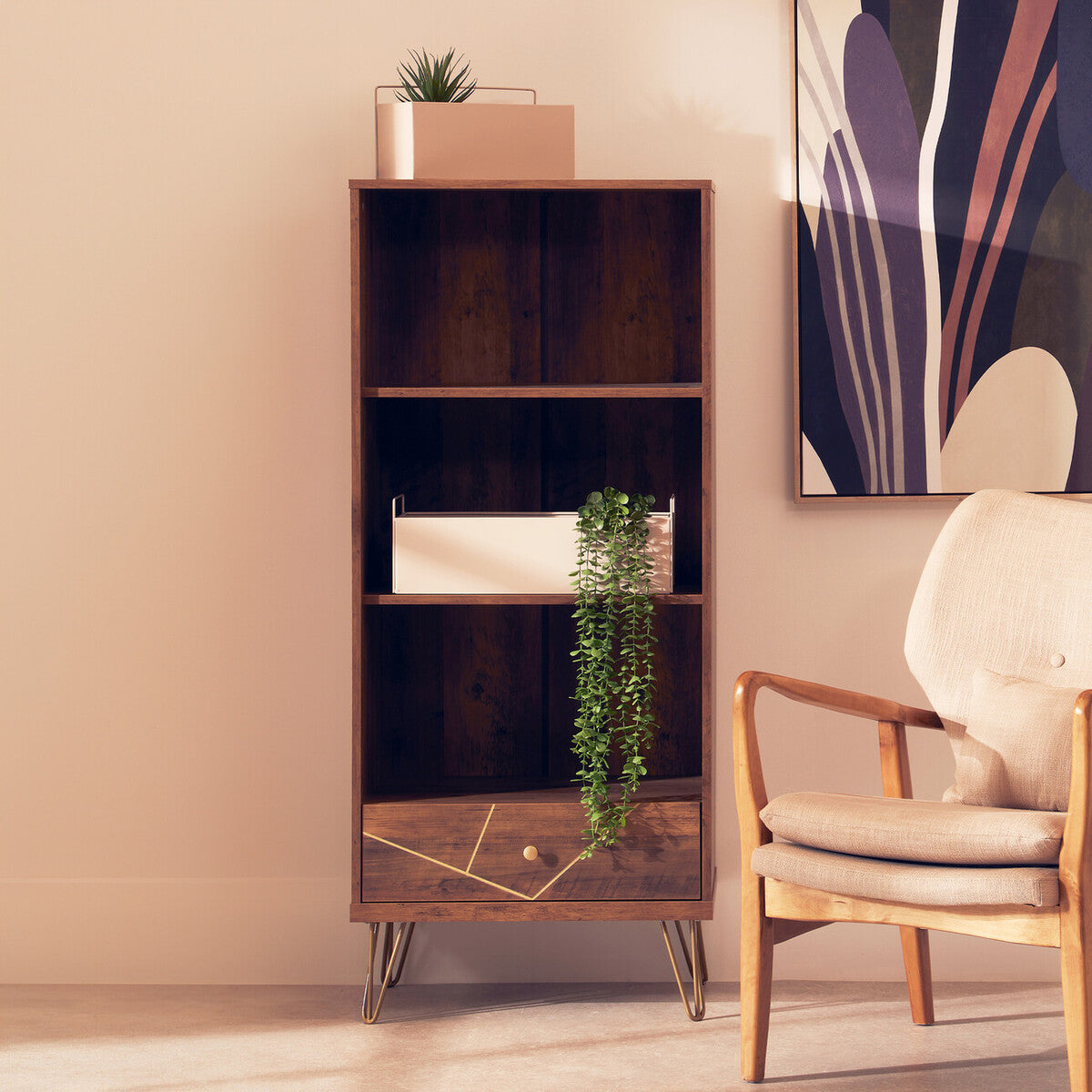Wooden bookshelf with decorative items in a room with a beige wall and a chair.