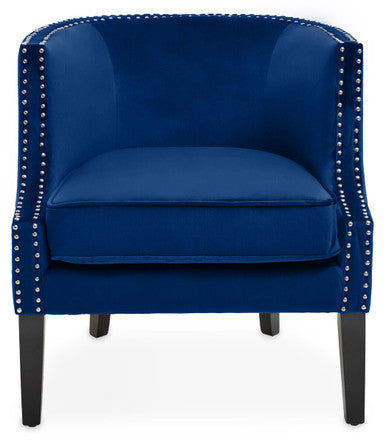 Blue armchair with nailhead trim on a white background