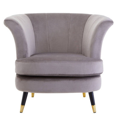 Gray velvet armchair with gold legs on a white background