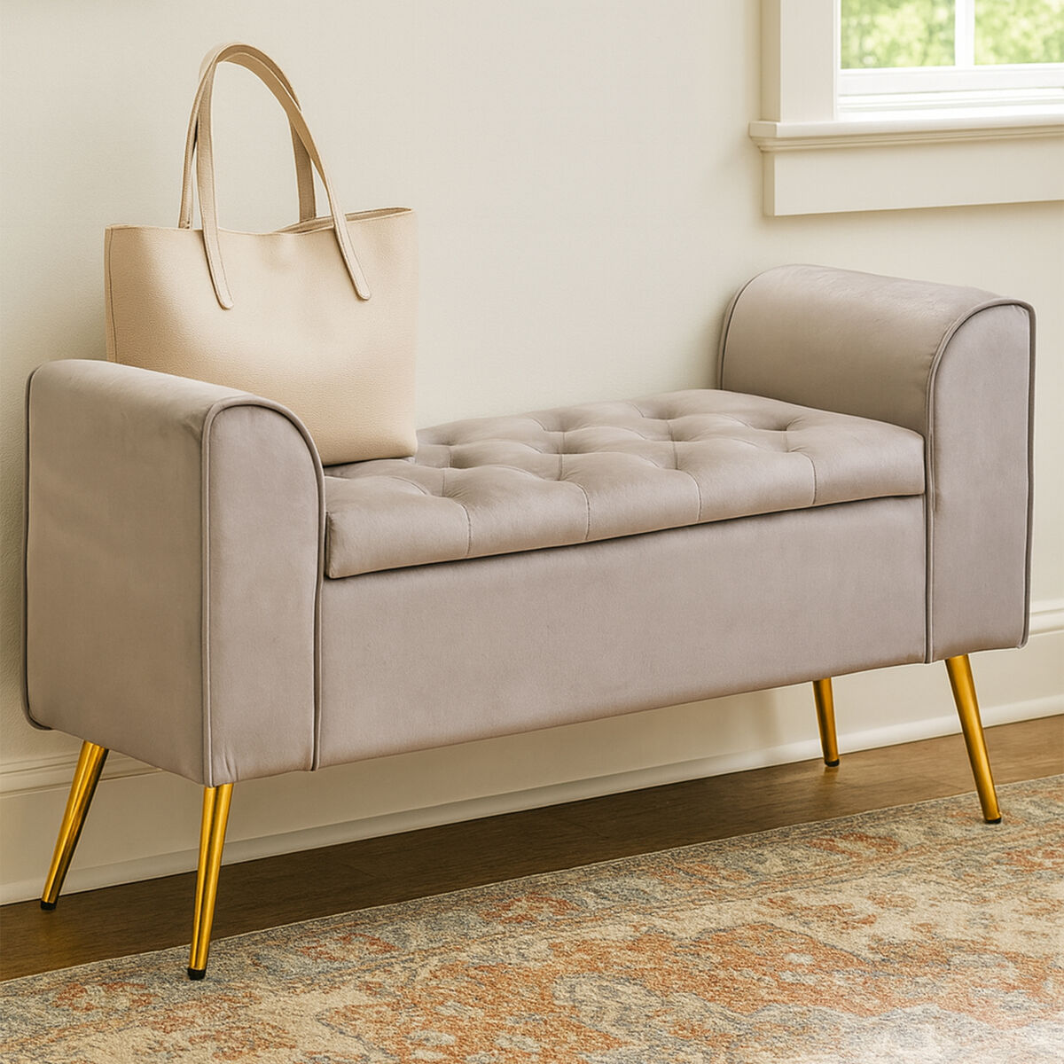 Beige tufted bench with gold legs in a room setting