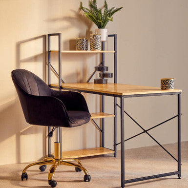 Wooden desk with black chair and shelves against a beige wall